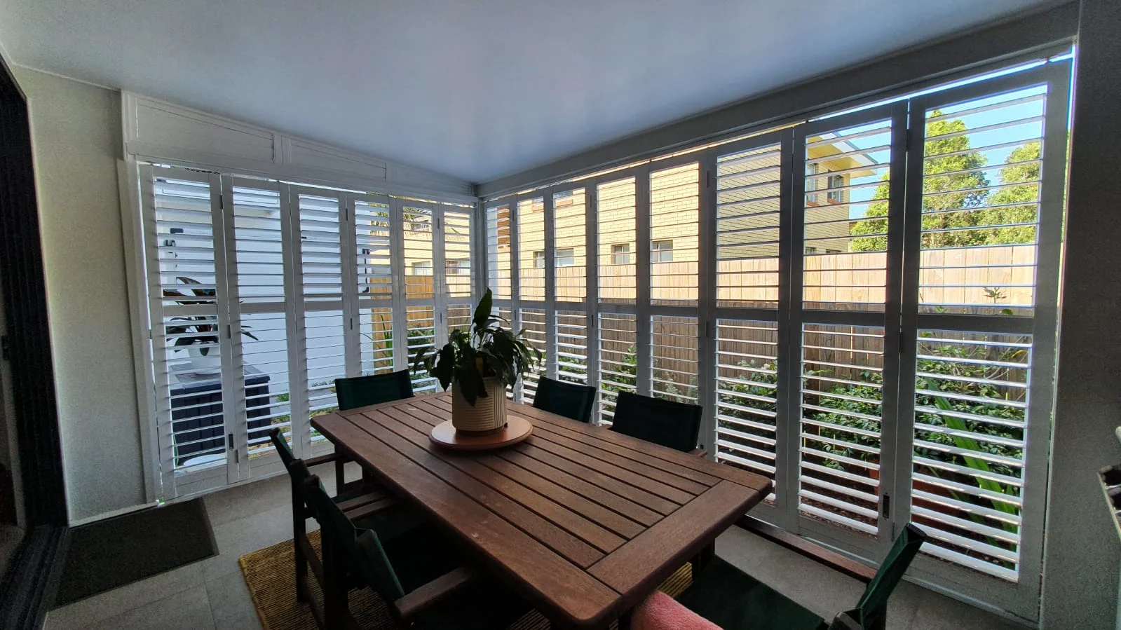 aluminium-bifold-patio-shutters-brisbane-raked-top-1 — Shutter Track Bifolding aluminium shutters — patio — shutters