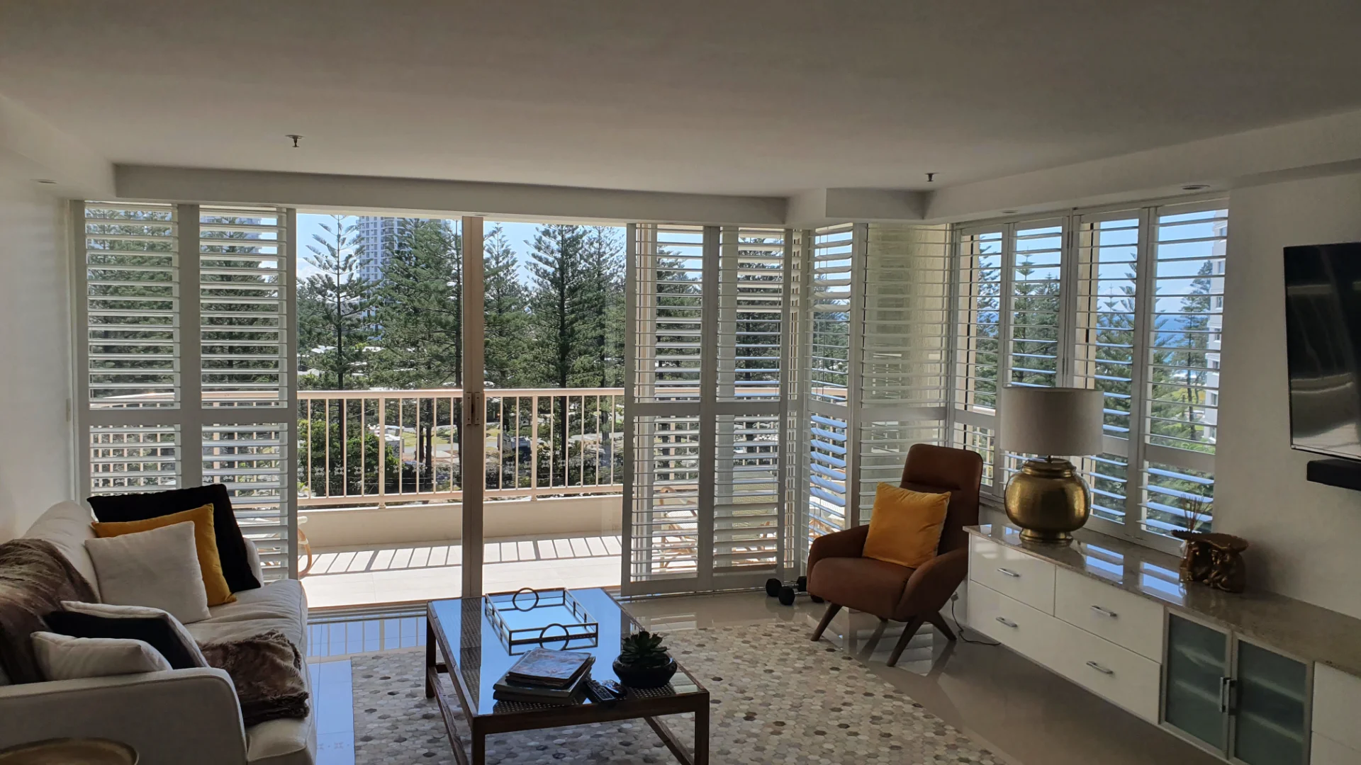 gold-coast-sliding-shutters-corner-hinged-living-1 — Shutter Sliding sliding with corner windows — living — shutters